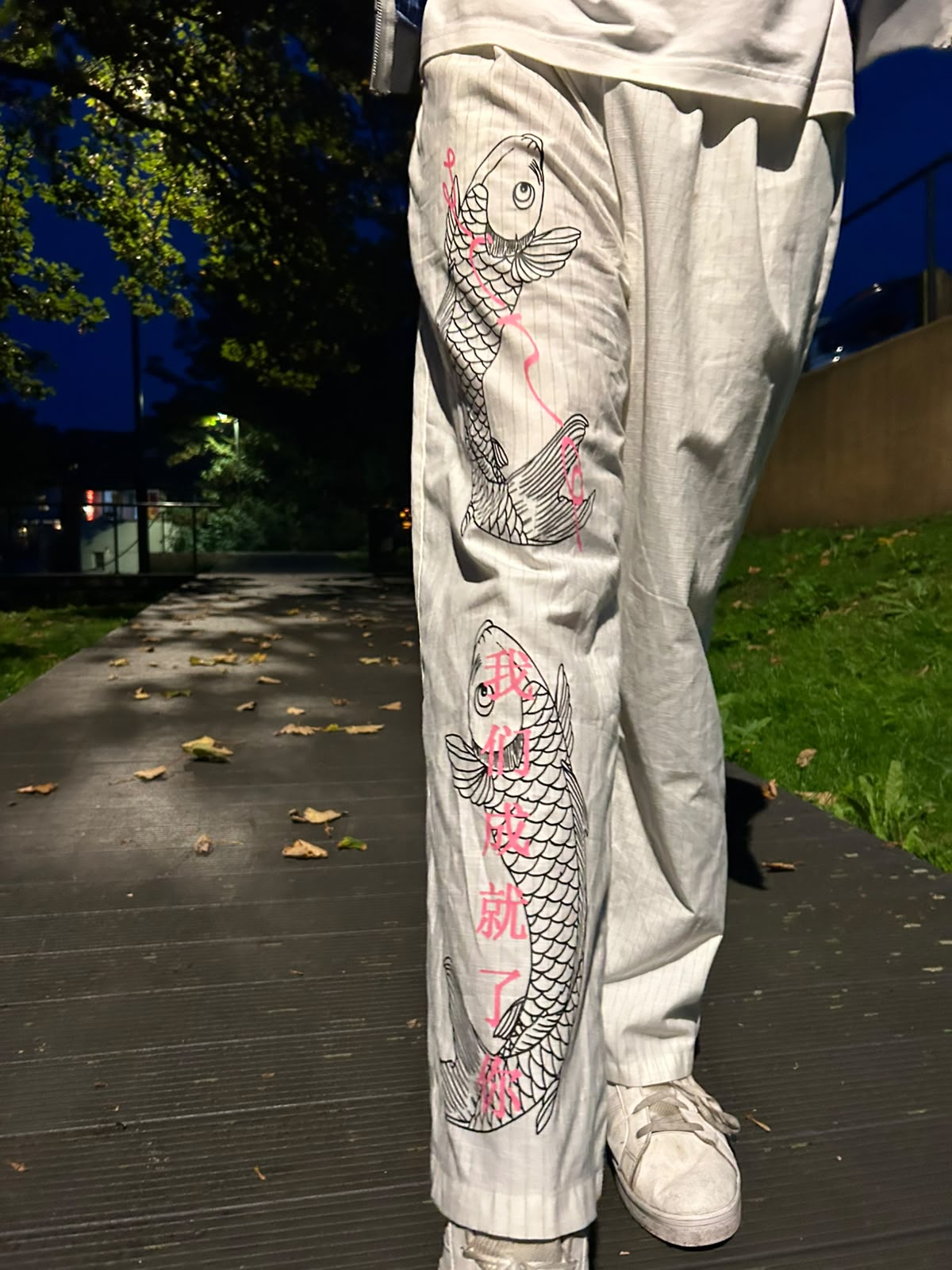 "We Make You" Koi Pleated Trousers